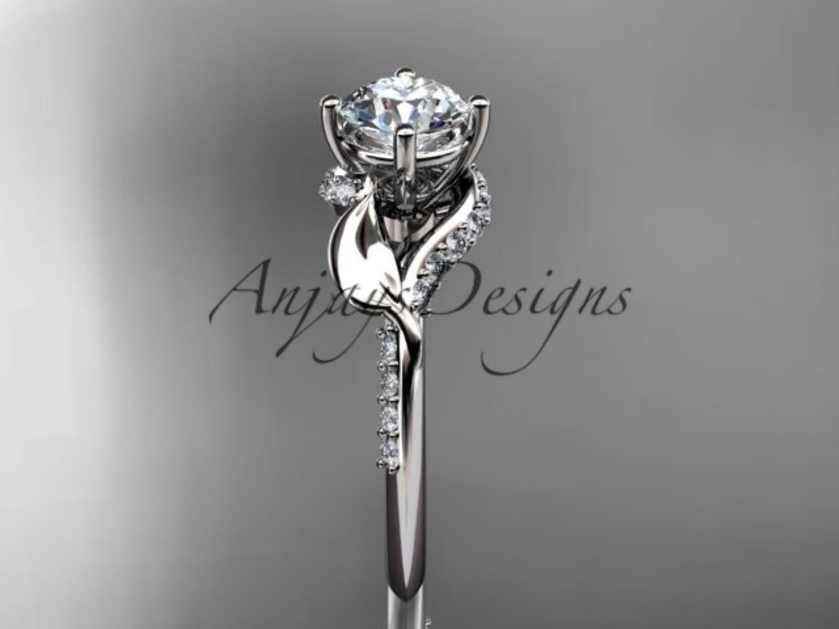 Side angle perspective showing delicate ribbon bypass cathedral setting with pave accents