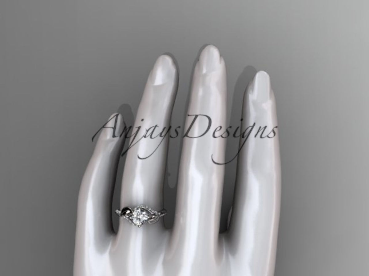 Macro close-up focusing on 1ct round D color VS1 lab grown center diamond and prong setting