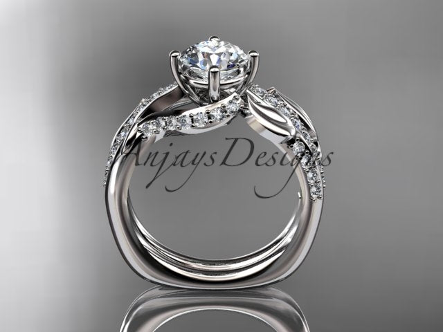 Three-quarter studio shot emphasizing polished 14K rose gold leaf motifs and moissanite brilliance