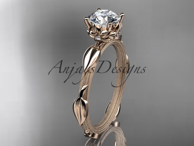 Nature inspired engagement ring with 1 carat round lab grown diamond and leaf vine branch design in 14k rose gold