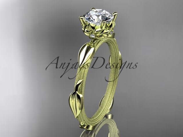 Nature inspired engagement ring with 1 carat round lab grown diamond and leaf vine branch design in 14k yellow gold