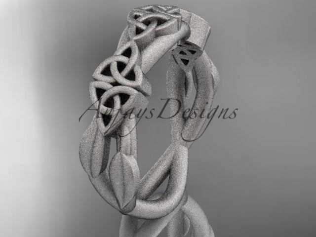 White metal Celtic trinity knot wedding band with flowing leaf details, shown at an angle.