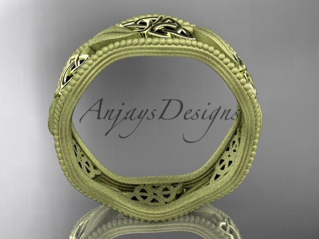 Yellow gold wedding band with a continuous decorative leaf pattern
Ad
Ad options
Learn more