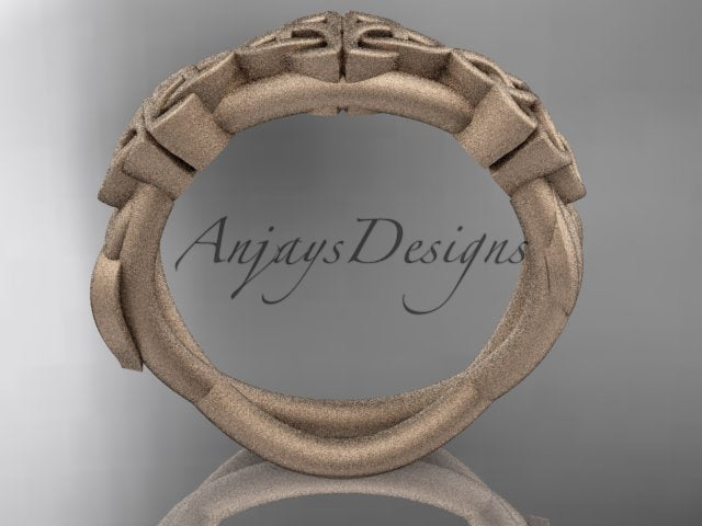 14K rose gold Celtic trinity knot wedding band showing the inner band and underside.