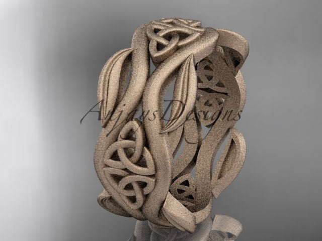 14K rose gold matte Celtic trinity knot wedding band with flowing leaf details, shown at an angle.