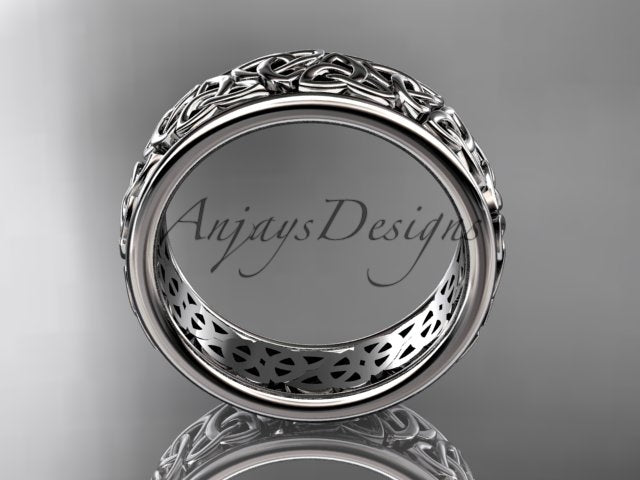 White metal Celtic knot wedding band showing its circular interior and openwork detailing.
