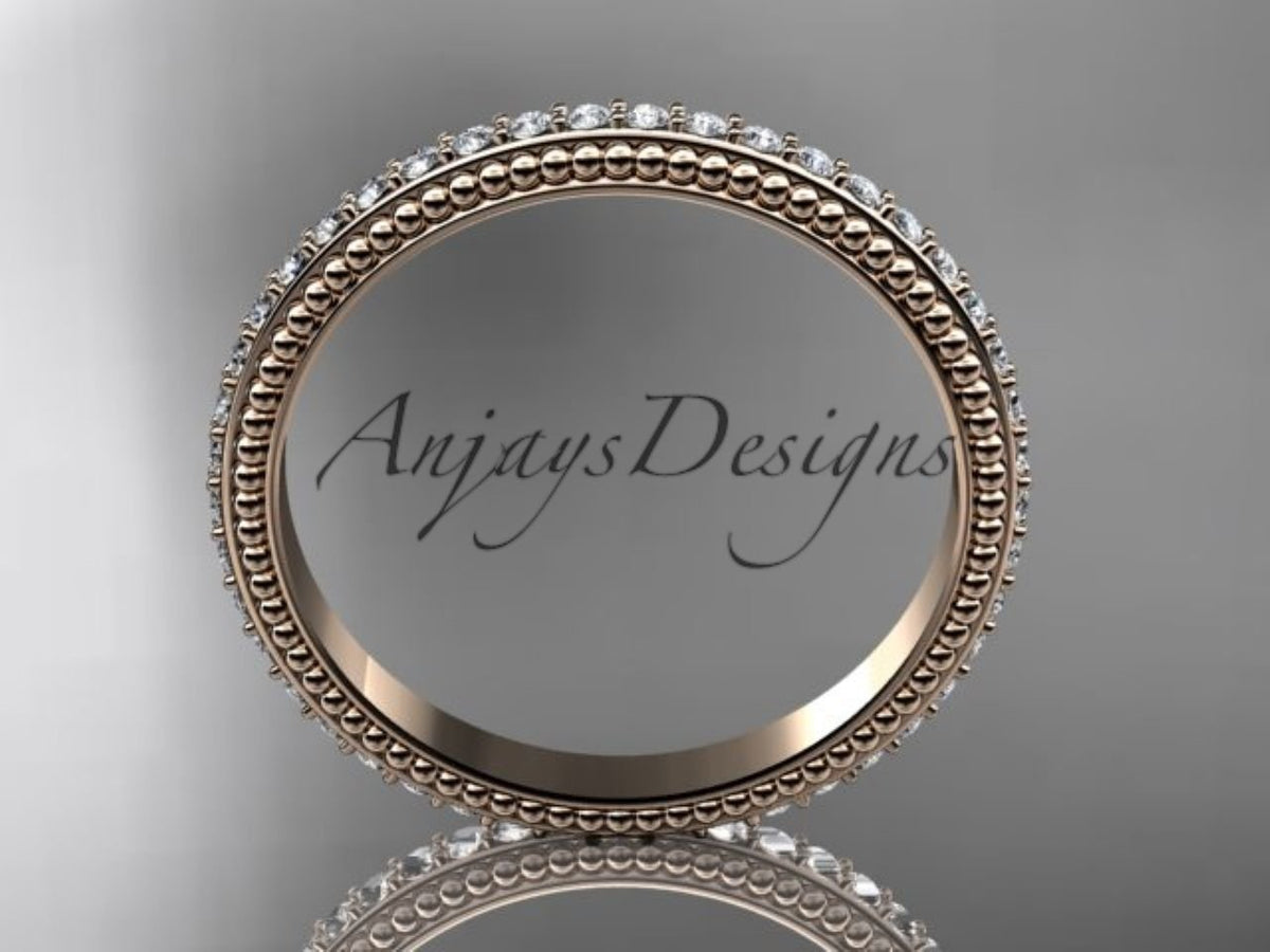 Close-up of milgrain detailing on the diamond wedding band