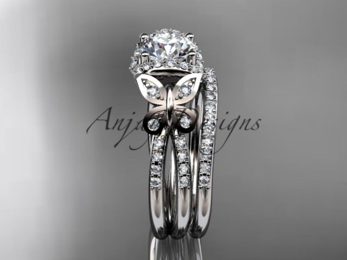 White gold butterfly engagement ring with coordinating diamond bands