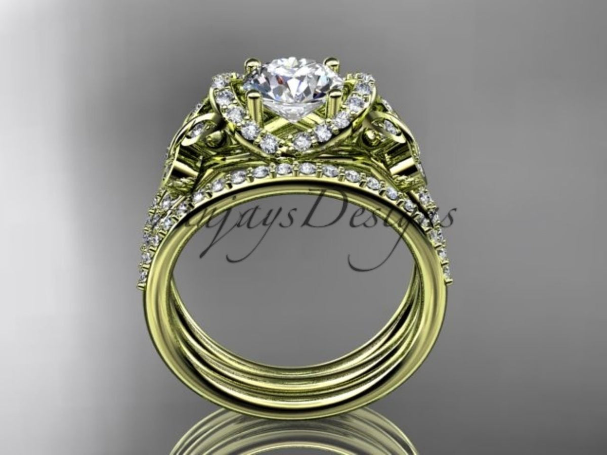 1. Yellow
 gold butterfly engagement ring with intricate sculptural details