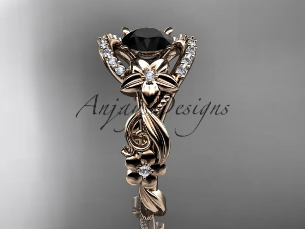 Black diamond center stone in a sculpted rose gold floral setting
