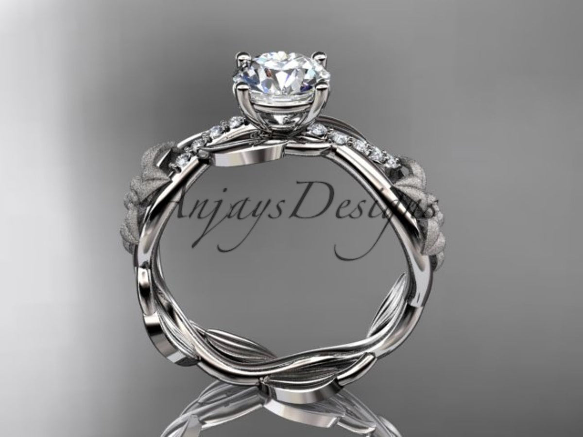 White gold diamond ring featuring sculpted floral petals