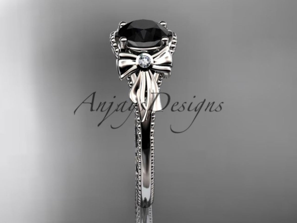 Black diamond center stone with sculpted bow flower detail