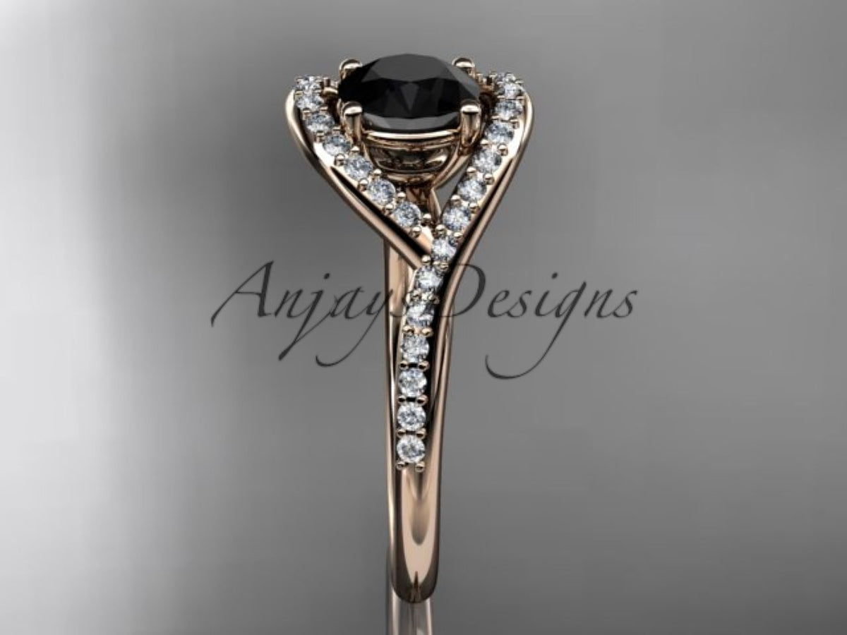 Black diamond center stone in a sculptural rose gold setting