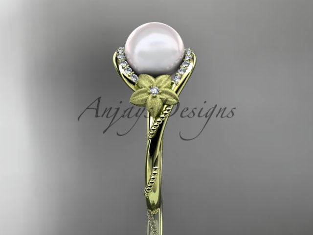 Close-up detail of 9.0mm white cultured pearl anchored by a textured 5-petal gold flower   