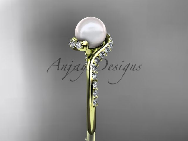 Close-up view of 6.5mm white cultured pearl paired with a curved pave diamond vine shoulder
