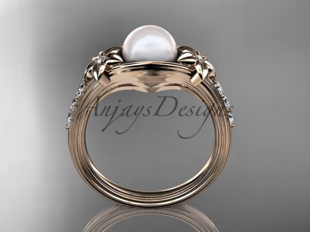 White gold engagement ring with eight diamond accents and cultured pearl
