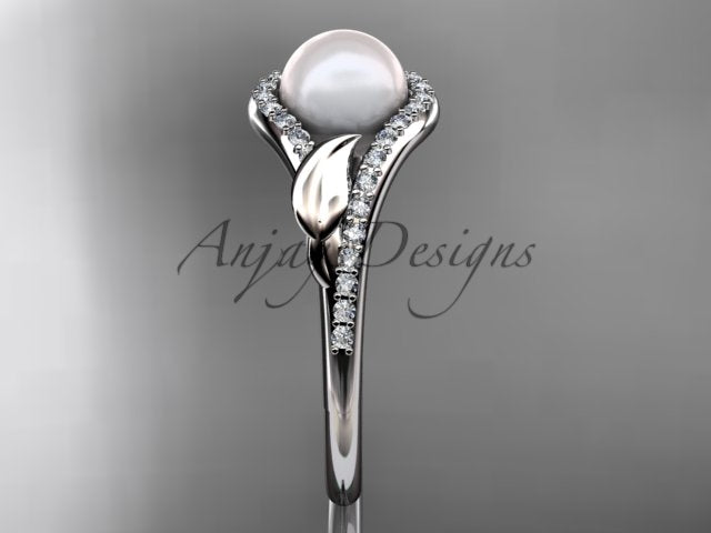 Rose gold engagement ring with a white pearl and diamond accents