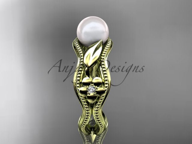 Intricate floral and vine design on a rose gold pearl ring