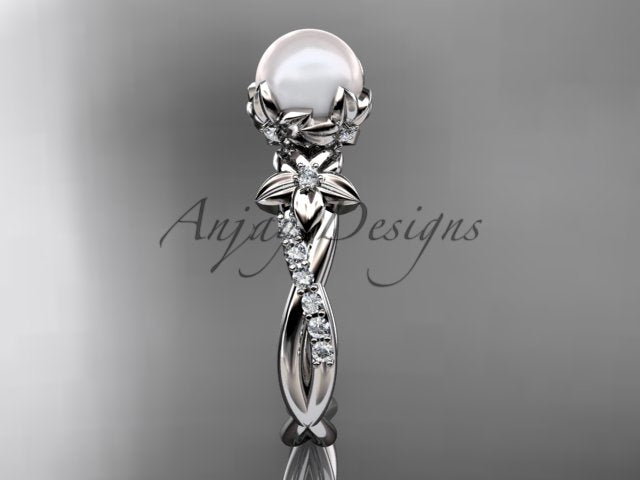 Close-up detail of 6.5mm white cultured pearl supported by a sculpted petal basket   