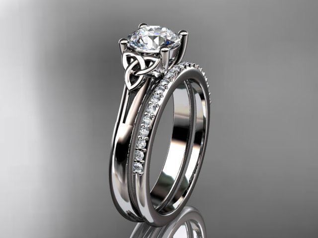 Celtic trinity knot engagement ring in warm white gold