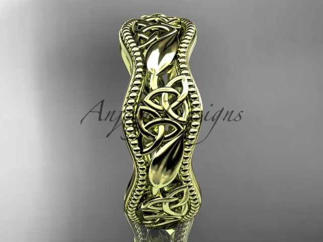 Side profile of 14K yellow gold Celtic trinity knot wedding band CT7190G displaying 2.4mm height