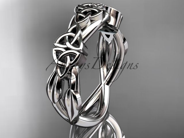 Close-up macro detail of intricate Celtic trinity knot and leaf pattern on 14K rose gold band CT7204G