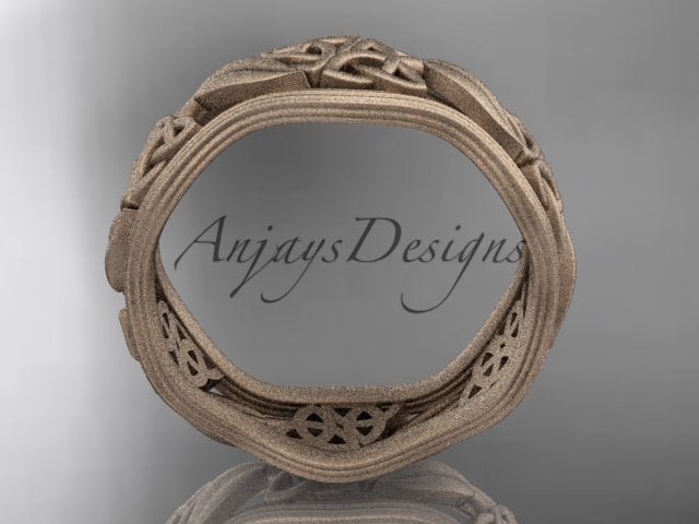 Close-up macro detail of intricate Celtic trinity knot texture and matte finish on 14K yellow gold band CT7504G   