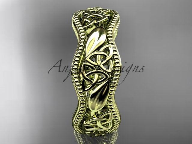Yellow gold Celtic wedding band, style CT7508P. Three-quarter view showcasing the vibrant yellow gold option with delicate hand-carved Celtic knots and raised leaf shoulders.