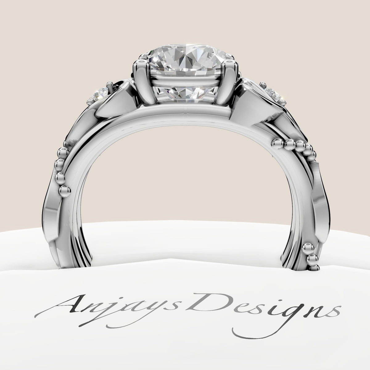 Trinity Knot engagement ring with leaf and vine wedding band