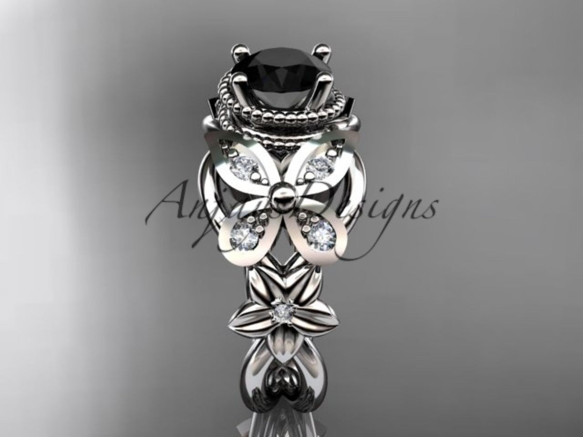 Black diamond center stone in a sculpted white gold floral setting