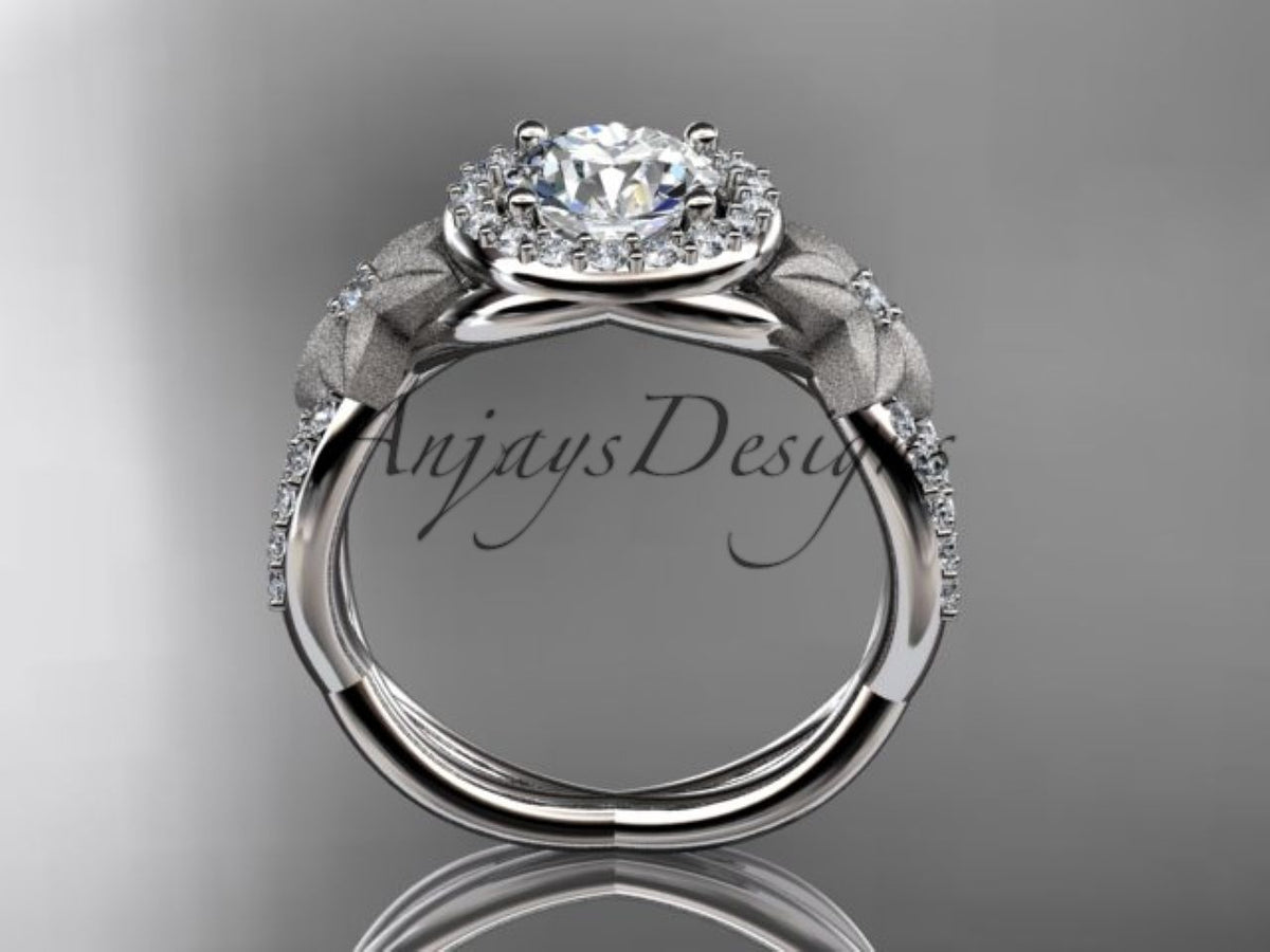 White gold diamond engagement ring, style ADLR127Side profile view showing the circular ring band and how the diamond halo sits above the finger.