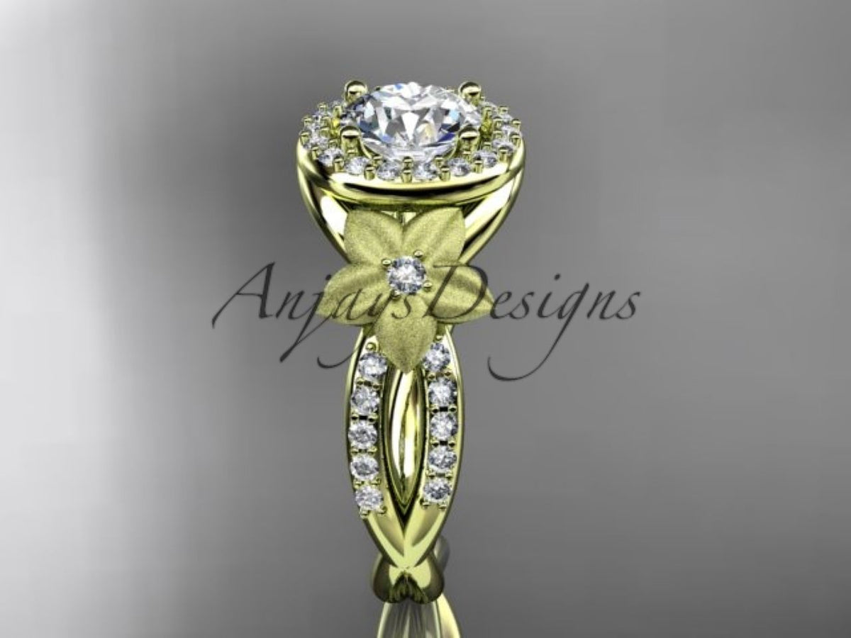 Yellow gold diamond engagement ring, style ADLR127. Front view showcasing the central round diamond halo and a matte-finish flower detail accenting the split diamond-pave band.