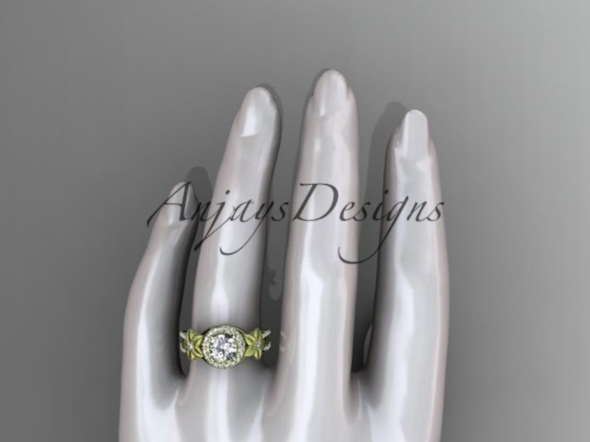• Yellow gold diamond engagement ring, style ADLR127worn on the ring finger of a white mannequin hand. Top-down view showing the scale of the round halo center stone.
