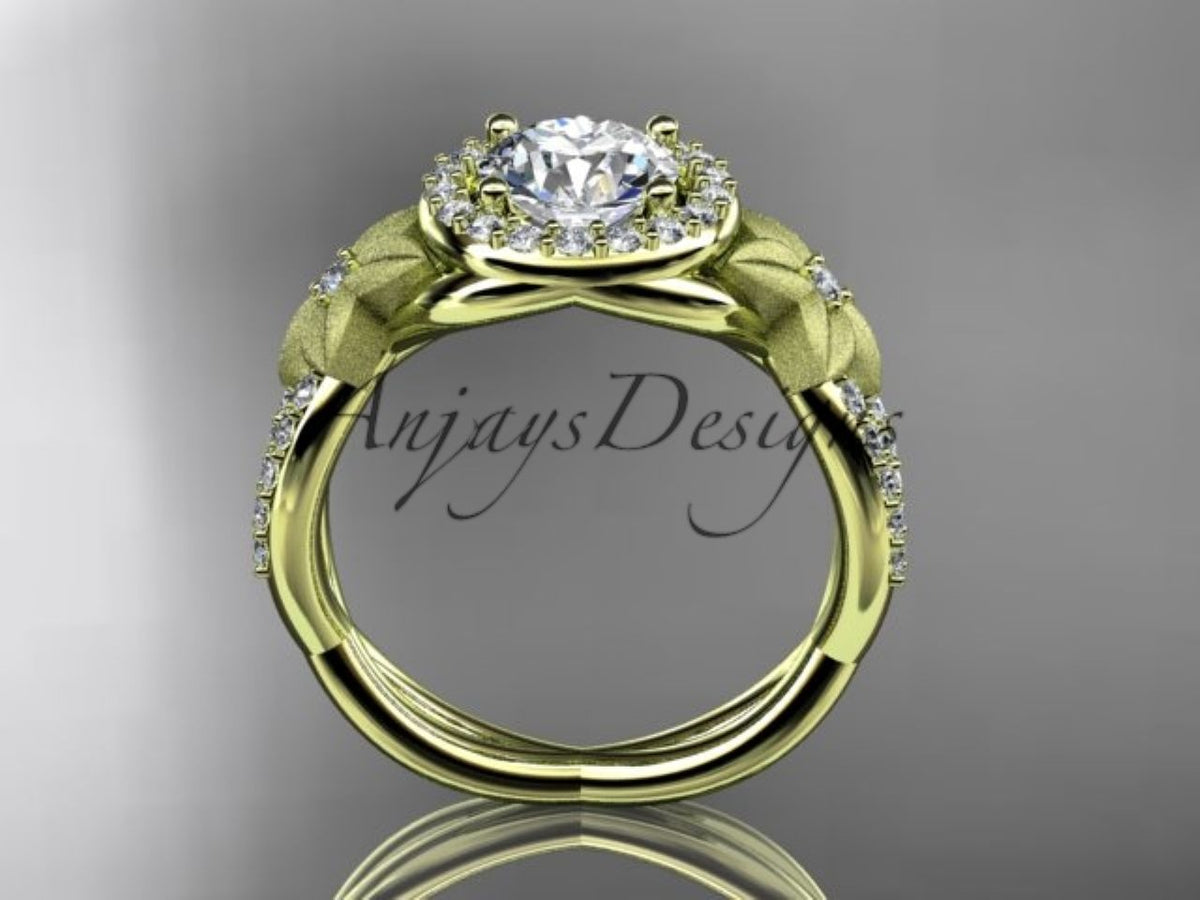 Yellow gold diamond engagement ring, style ADLR127. Side profile view showing the circular band shape, diamond setting framework, and frosted leaf patterns along the shoulders.