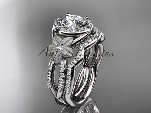  White gold diamond wedding ring set, style ADLR127S. Three-quarter view displaying the polished white gold variant with a round halo setting and textured flower accent.