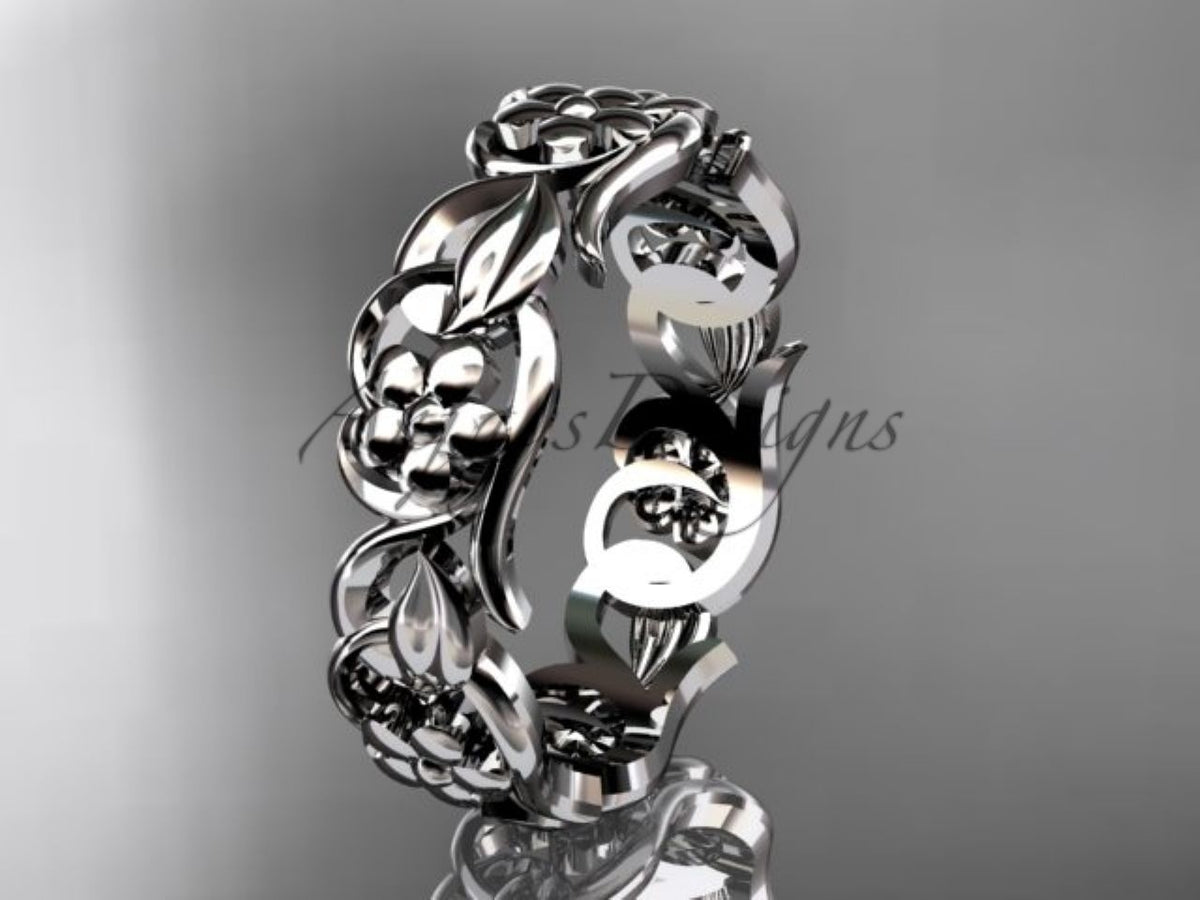 White gold floral wedding band, style ADLR537G. Angled to the left, highlighting the detailed side-profile metalwork and raised leaf patterns.