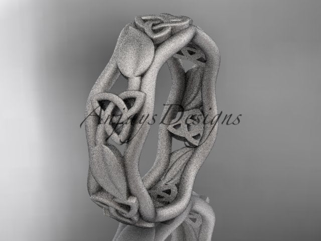 Platinum Celtic wedding band, style CT7105B. Three-quarter view displaying a polished white platinum band configured as a twisting twig with detailed open triquetra knots and leaf clusters.