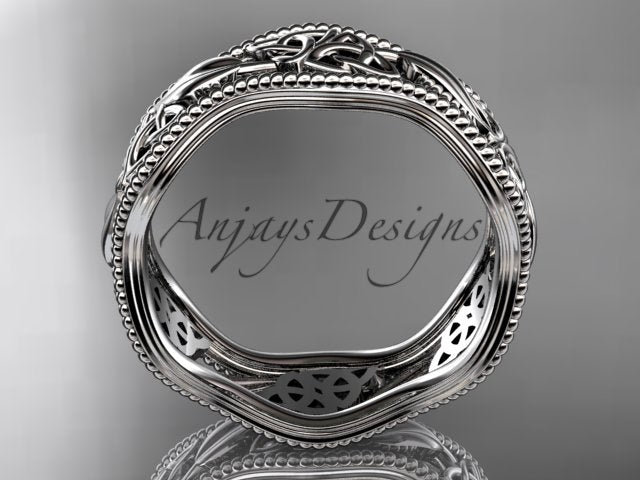 Platinum Celtic wedding band, style CT7508P. Side profile view showing the contoured wavy silhouette of the white metal ring band.