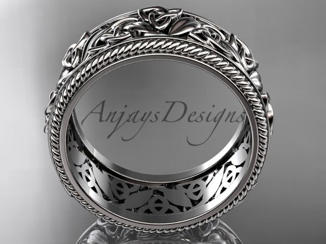Platinum wide Celtic wedding band, style CT7508P. Side profile view showing the uniform circular silhouette and detailed inner openwork filigree of the white platinum band.