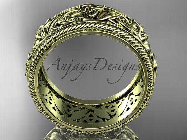 Yellow gold wide Celtic wedding band, style CT7508P. Side profile view showing the uniform circular profile of the substantial band and the hollow openwork filigree carved through the yellow gold inner lining.
