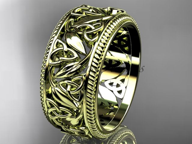 • Yellow gold wide Celtic wedding band, style CT7508P. Three-quarter view showcasing the vibrant yellow gold option with delicate hand-carved Celtic knots and raised leaf details across a wide band.
