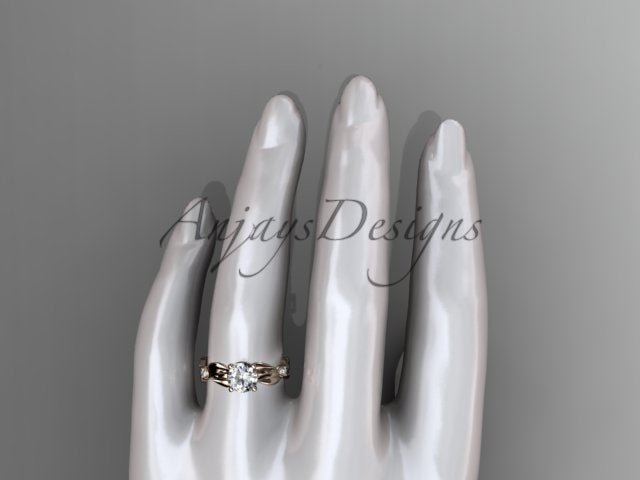 Close up of leaf and vine engagement ring with 1 carat round lab grown diamond in 14k rose gold