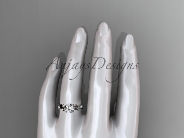 Close up of leaf and vine engagement ring with 1 carat round lab grown diamond in 14k white gold