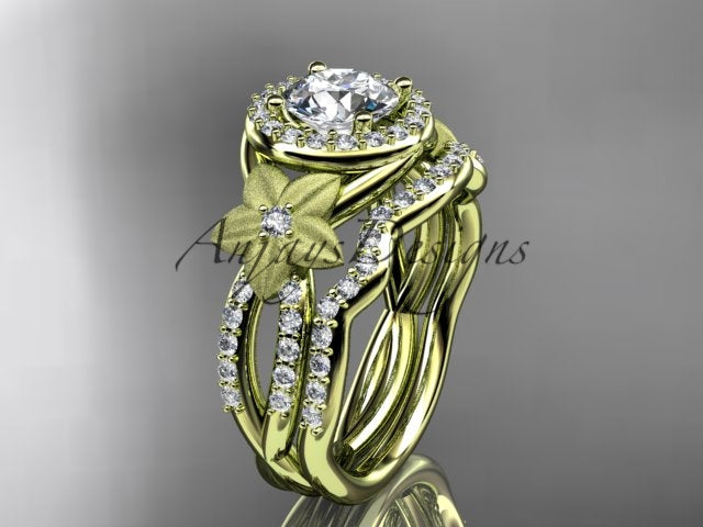 • White gold diamond wedding ring set, style ADLR127S, worn on the ring finger of a white mannequin hand. Top-down view showing the scale of the round halo center stone and twin flanking flowers.

