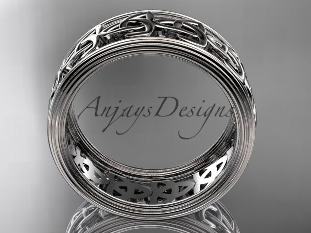 Interior view of a platinum Celtic wedding band with decorative knotwork