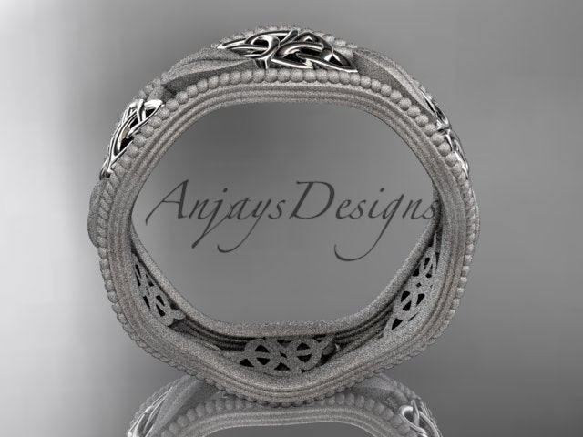 Platinum wedding band with ornamental leaf patterns and decorative borders