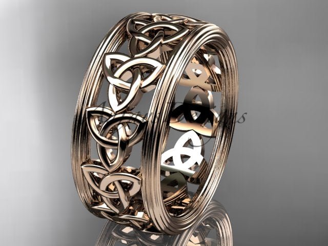 Rose gold Celtic wedding band with repeating trinity knots and polished parallel borders