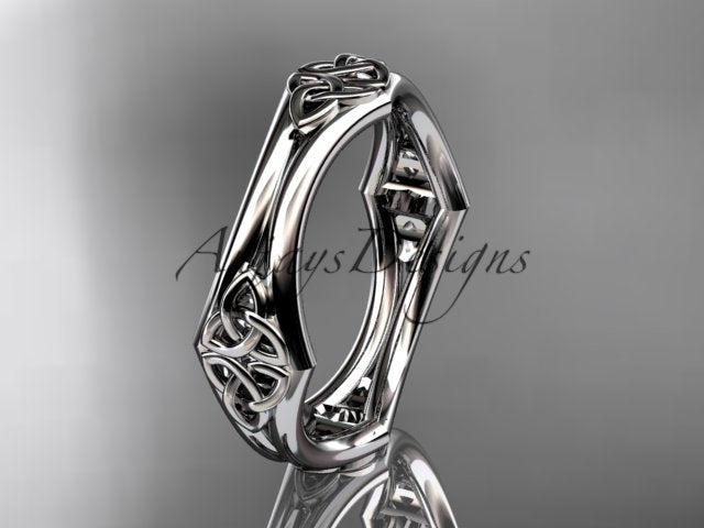White metal Celtic trinity knot wedding band shown at an angle, displaying its openwork design.