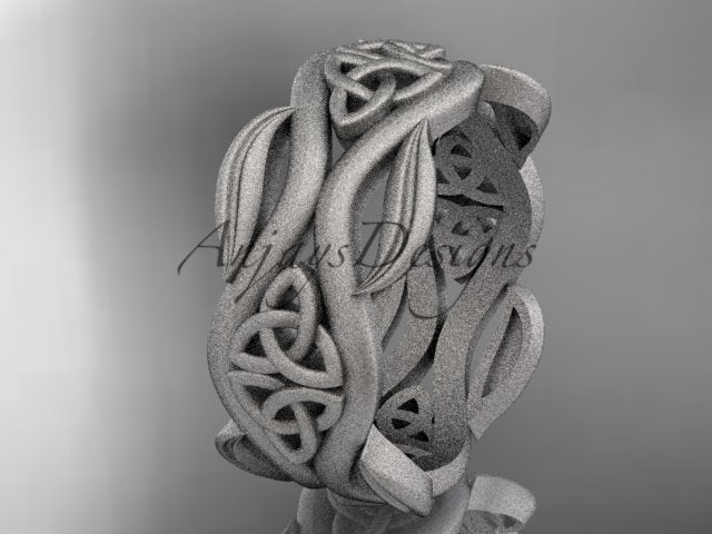 White metal matte Celtic trinity knot wedding band with flowing leaf details, shown at an angle.