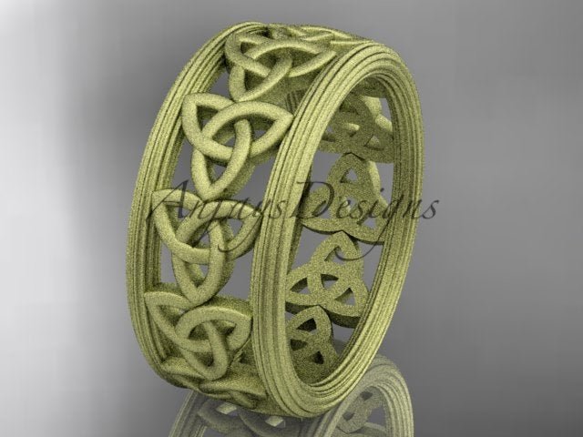 Yellow gold Celtic wedding band with repeating trinity knot motifs and fine borders